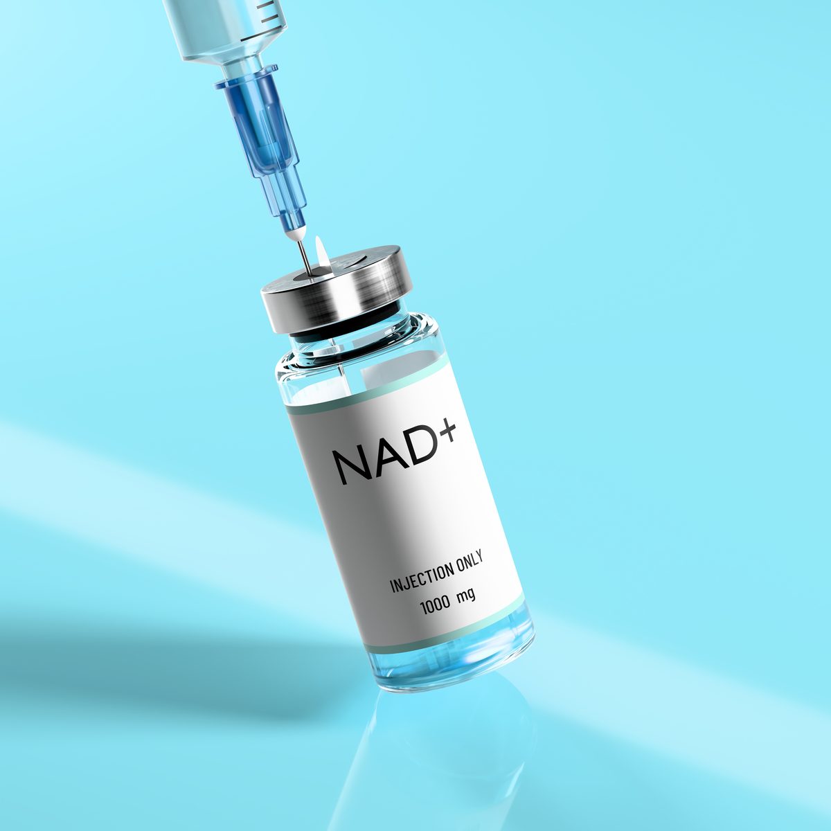 A syringe drawing from a vial labelled NAD+