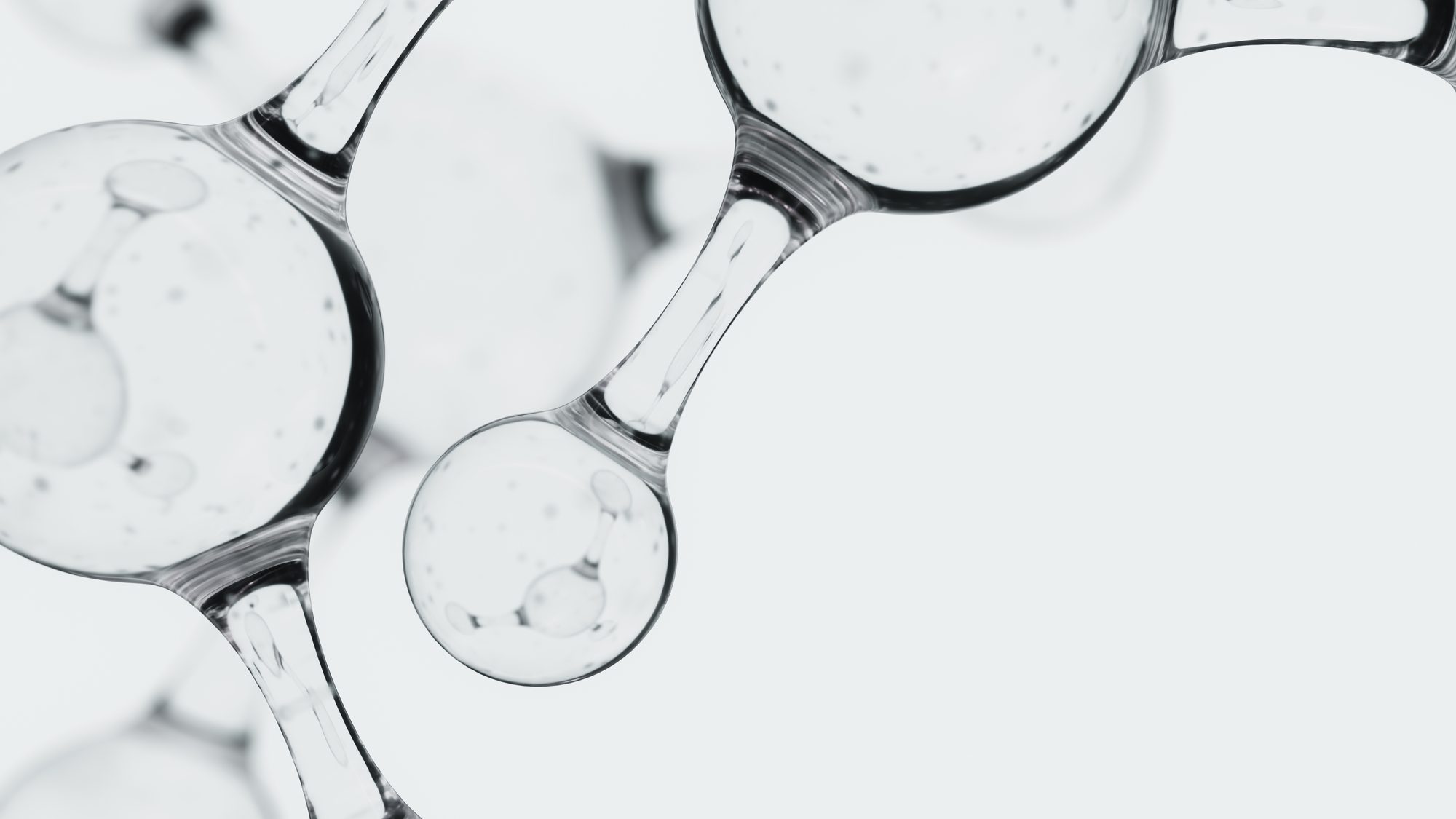Translucent spheres linked in a chain, like a molecular model